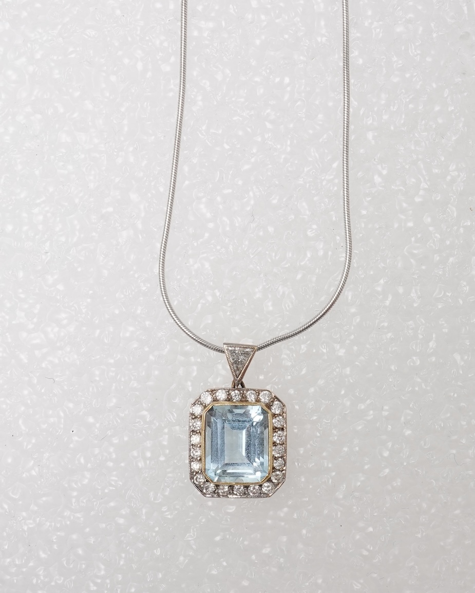 An aquamarine and diamond pendant